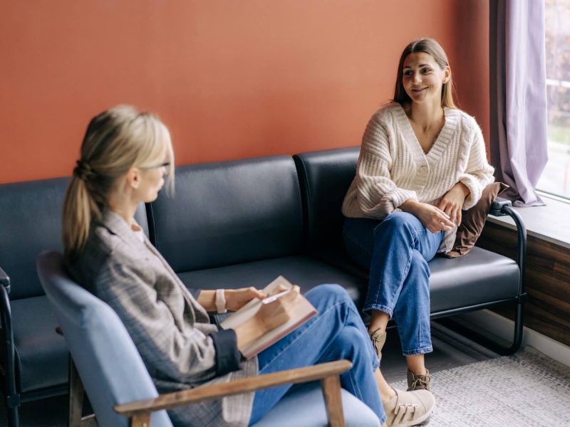 a-smiling-woman-talks-to-a-professional-coach-about-mental-health-and-development-.jpg